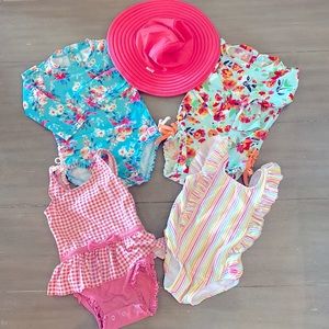 4 Ruffle Butts swimsuits and matching hat, Size 18-24 months.  Great condition!